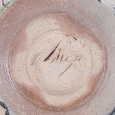 An incised signature on a bowl made by Claude Champy sold at auction by Maak Contemporary Ceramics