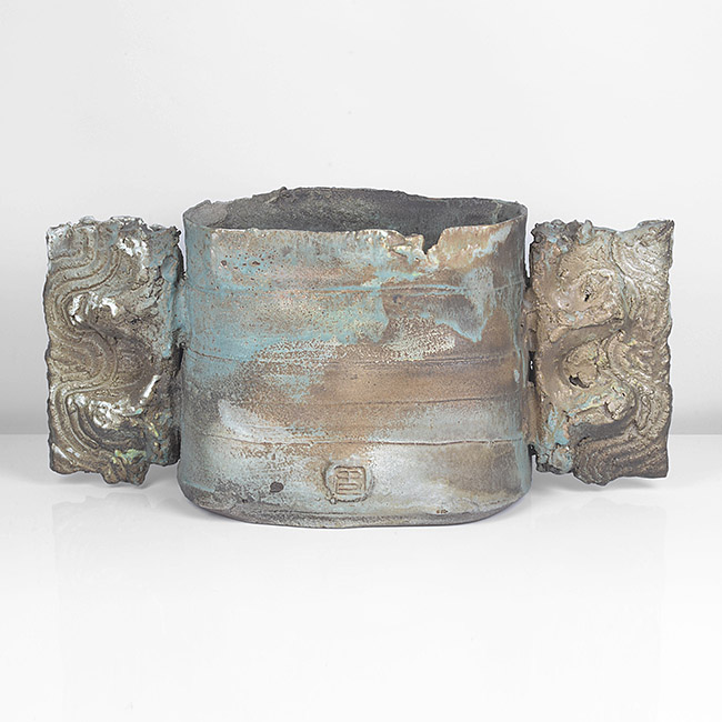 A turquoise, grey, brown and white vessel with wings made by Colin Pearson in 1988 sold at auction by Maak Contemporary Ceramics