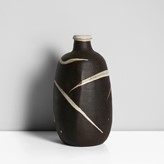Janet Leach | Stoneware, dry dark brown body with white splashes around the body, and white glaze to the interior and rim, impressed JL and Leach Pottery seals