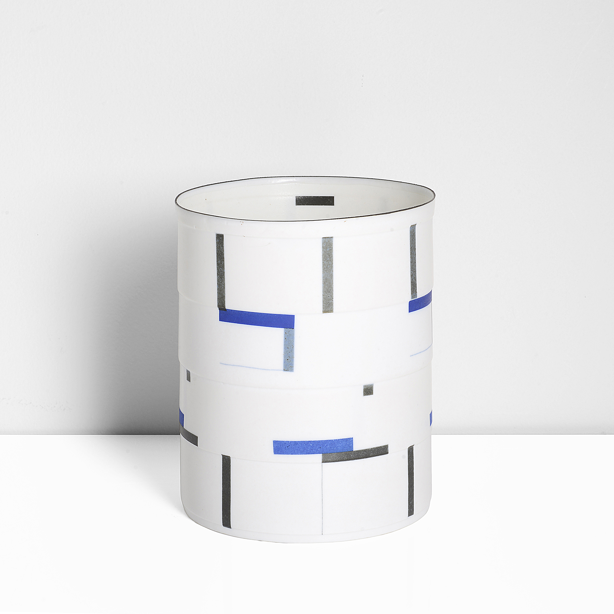 A porcelain stepped cylinder made by Bodil Manz sold at auction by Maak