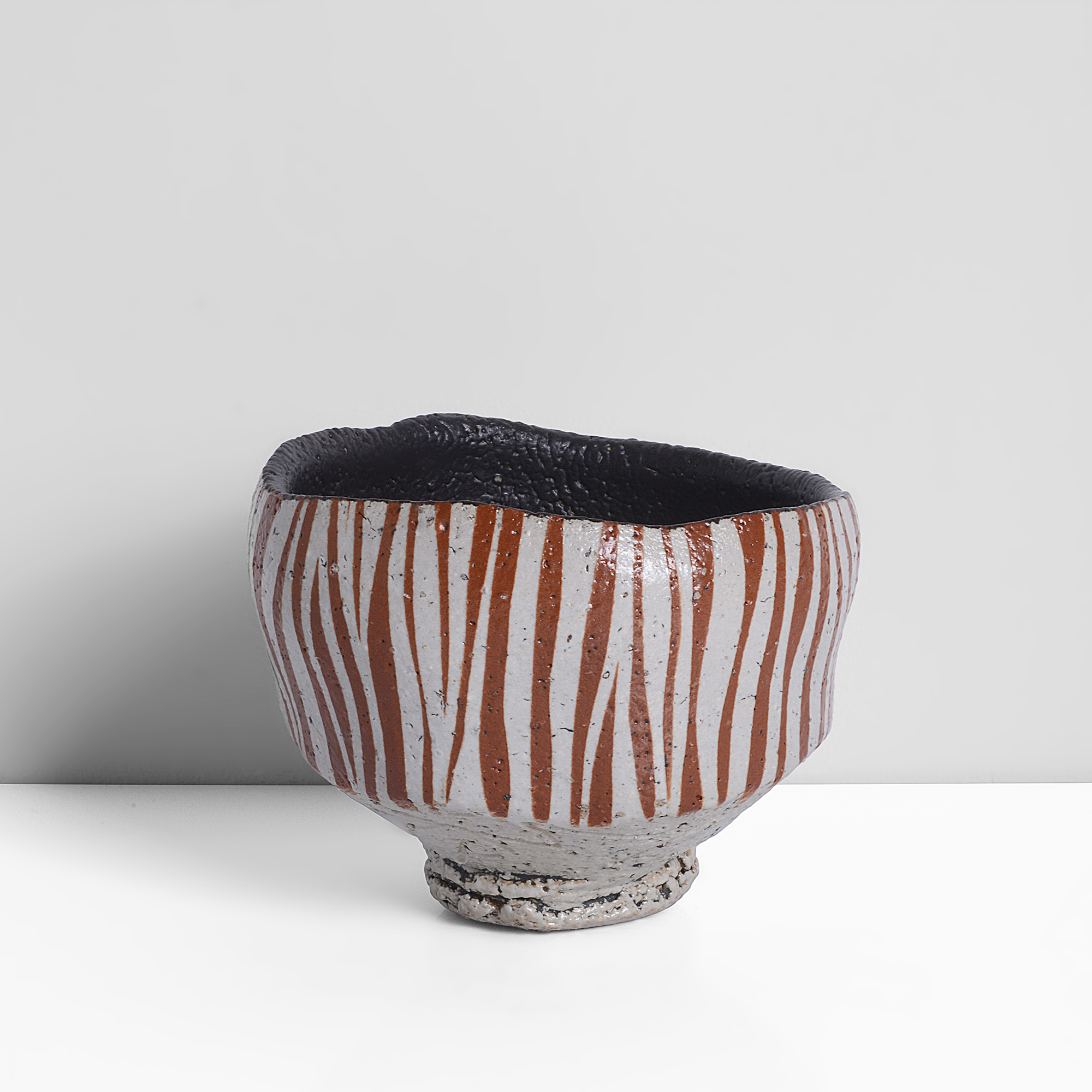 A stoneware chawan or tea bowl made by Ichino Masahiko sold at auction by Maak