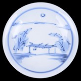 A porcelain open bowl made by Tomimoto Kenkichi sold at auction by Maak Contemporary Ceramics