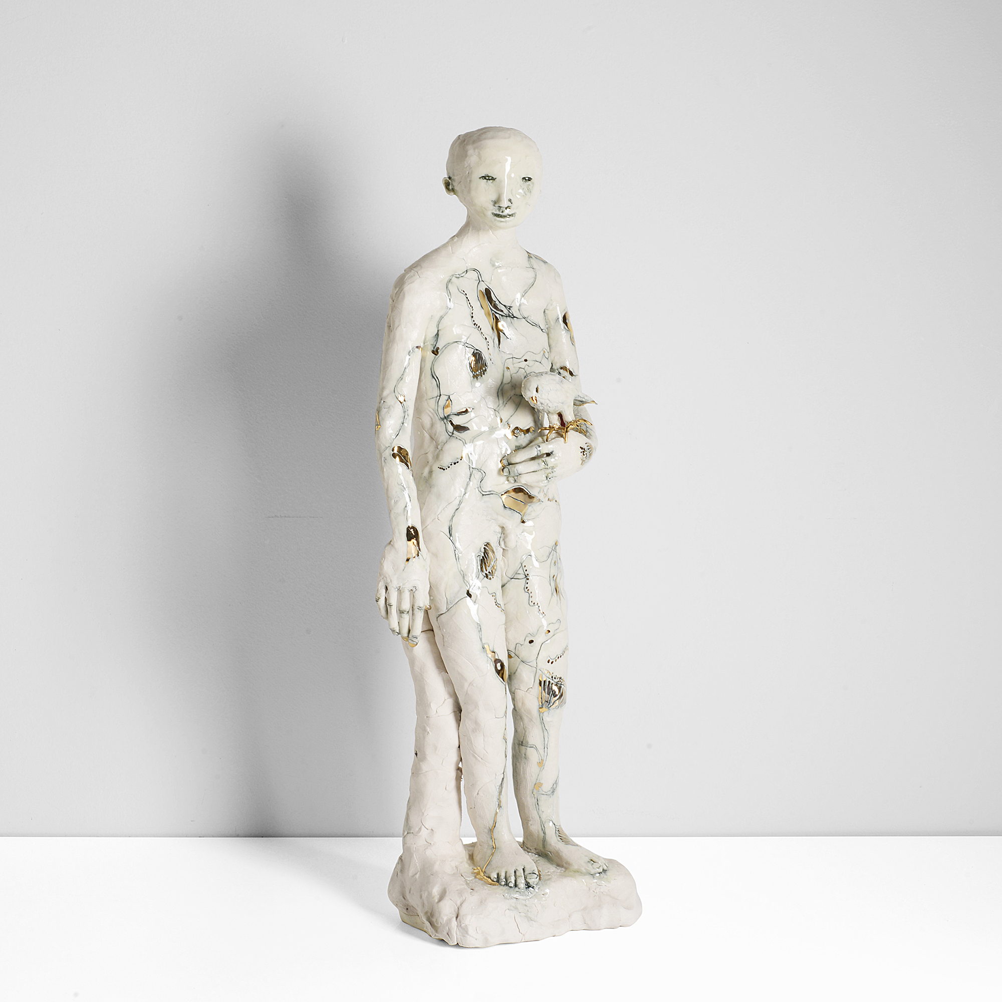 A porcelain figure 'Hunter Boy VI' made by Claire Curneen sold at auction by Maak