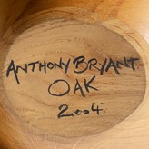 Painted signature and date on an oak vessel by Anthony Bryant