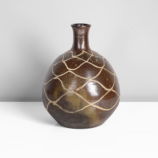 A white slip and brown stoneware bottle vase made by Japanese artist Ichino Shigeyoshi sold at auction by Maak