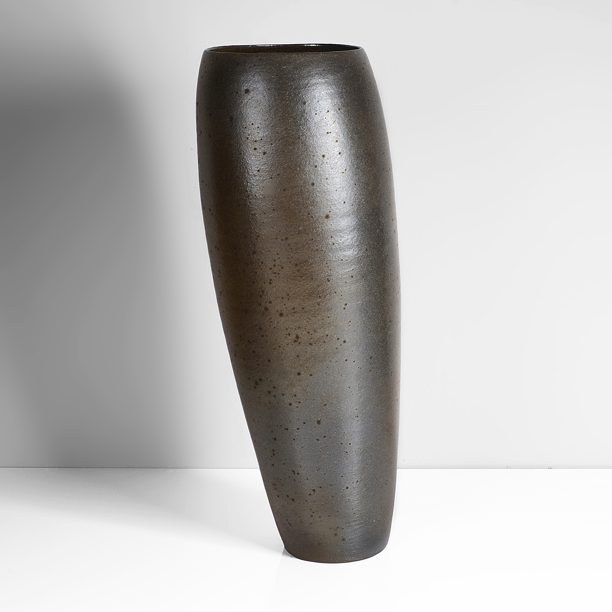 Maak | Joanna Constantinidis Stoneware, lustrous golden and silvery glaze with a strong iron speckle and flashes of rust brown, expressed throwing rings to the interior, impressed C seal