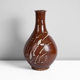 Maak | Jim Malone Ceramic Vase Stoneware, layered persimmon over cream glazes with expressive foliate wax relief motifs, impressed JM and Lessonhall Pottery marks