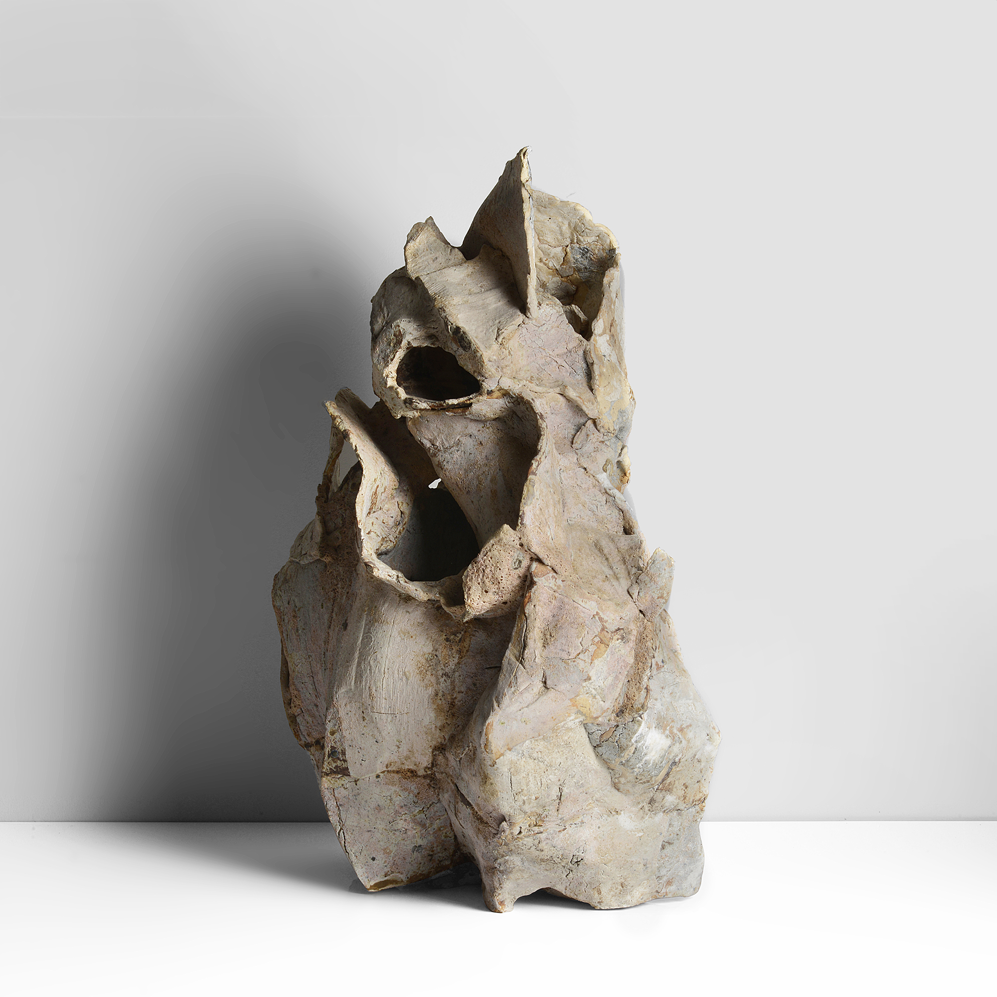 A mixed laminated clay sculptural form made by Ewen Henderson in 1988