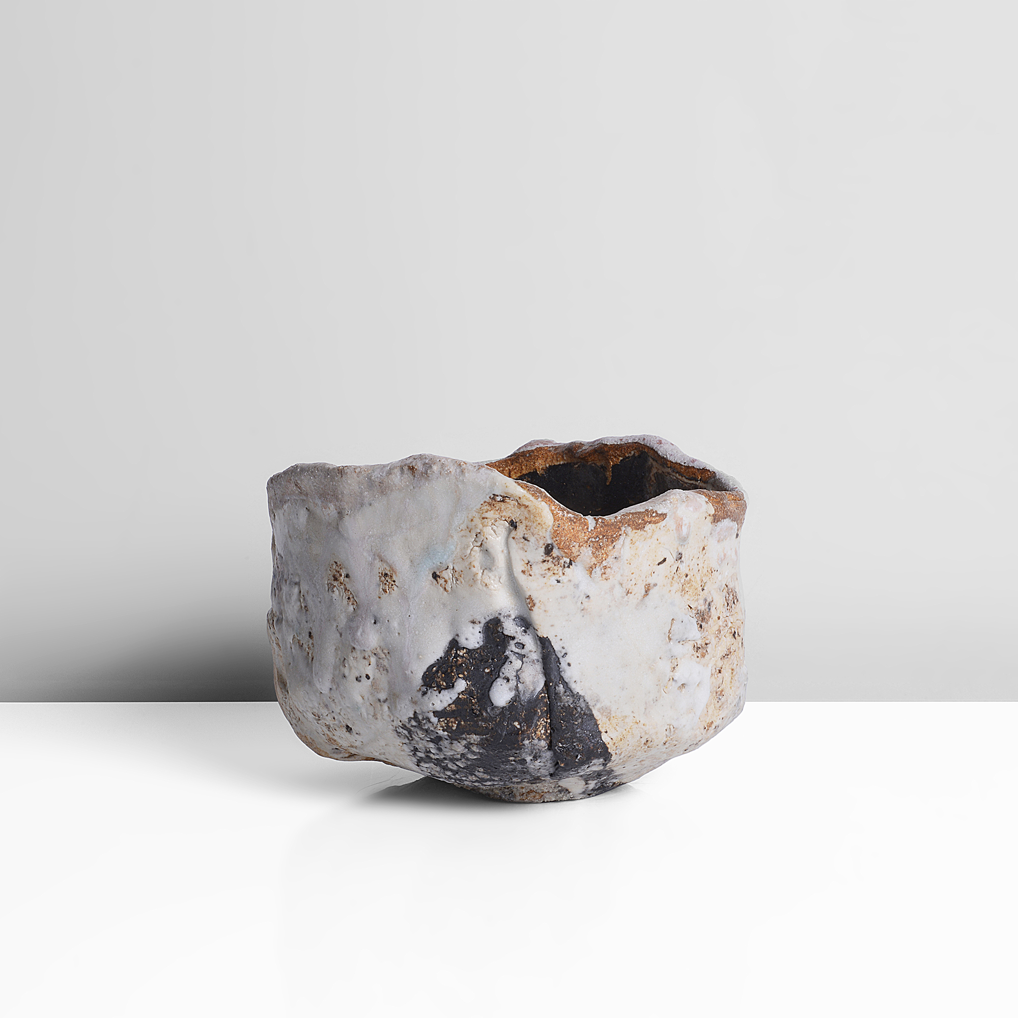 A mixed laminated clay tea bowl made by Ewen Henderson