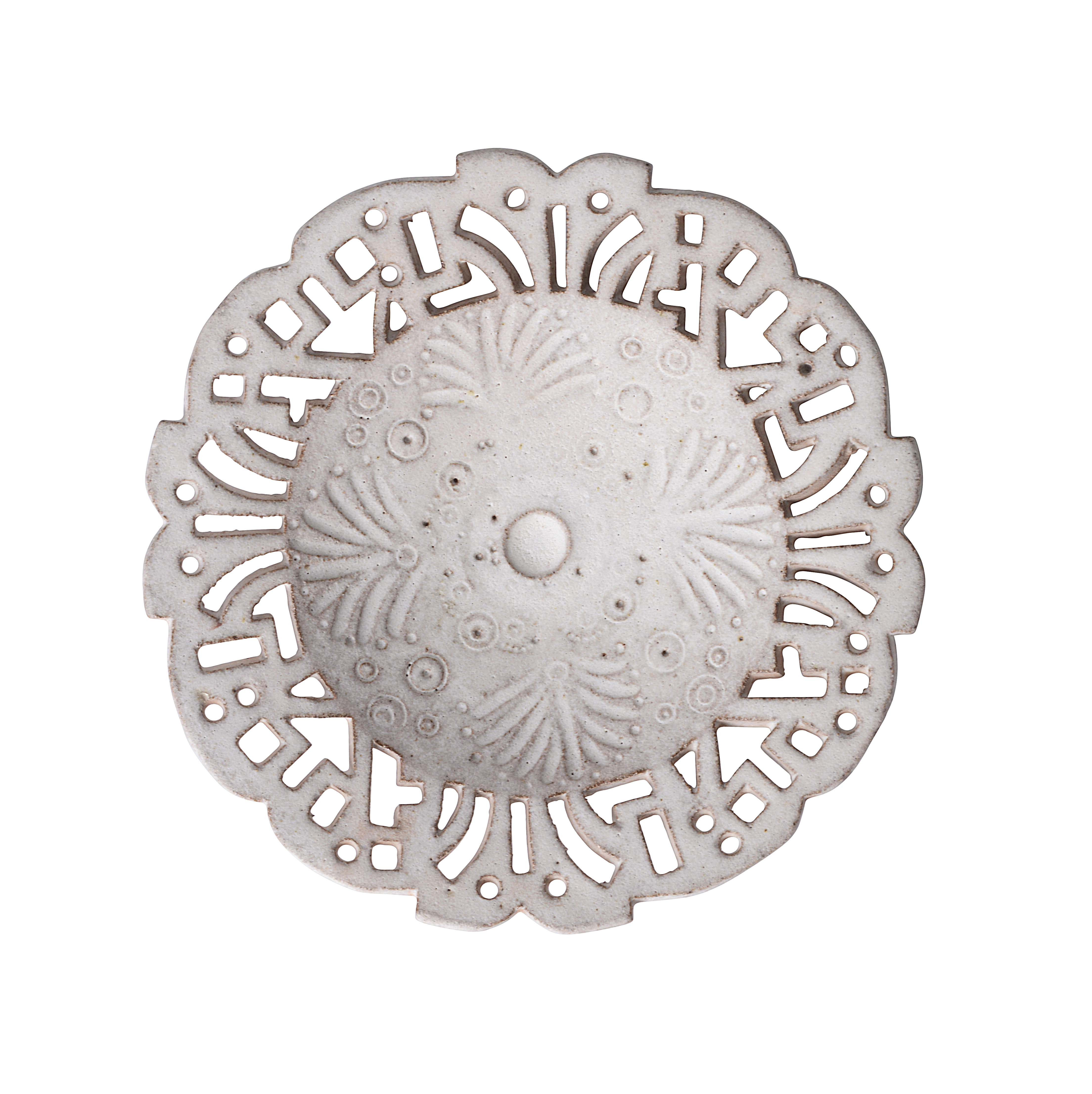 A white glazed stoneware pierced dish made by Ian Godfrey