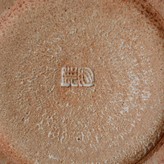 An impressed maker's mark on a tamba vase made by Ichino Masahiko sold at auction by Maak