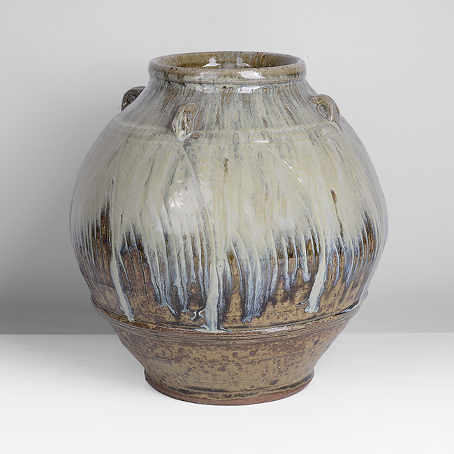 A cream and iron stoneware jar made by Mike Dodd sold at auction by Maak Contemporary Ceramics