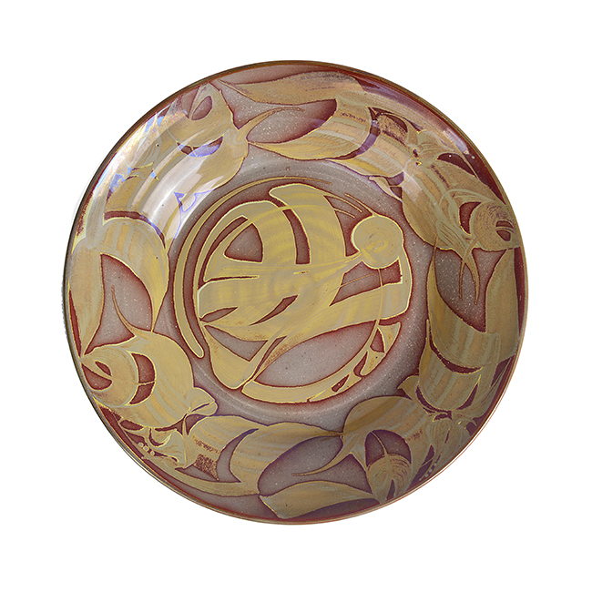 A red and gold earthenware charger made by Alan Caiger-Smith in 1974 sold at auction by Maak