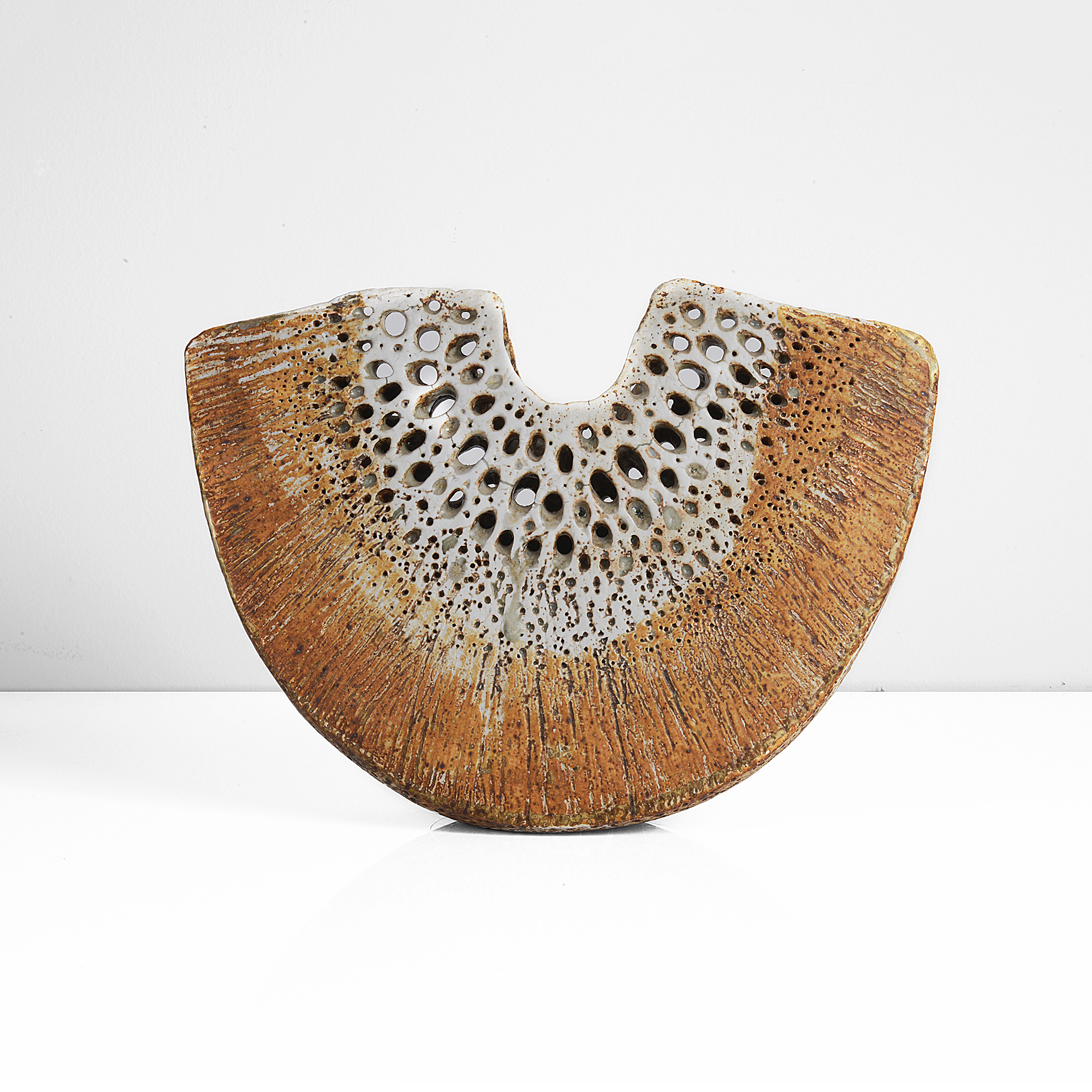 A stoneware crescent form made by Alan Wallwork sold at auction by Maak