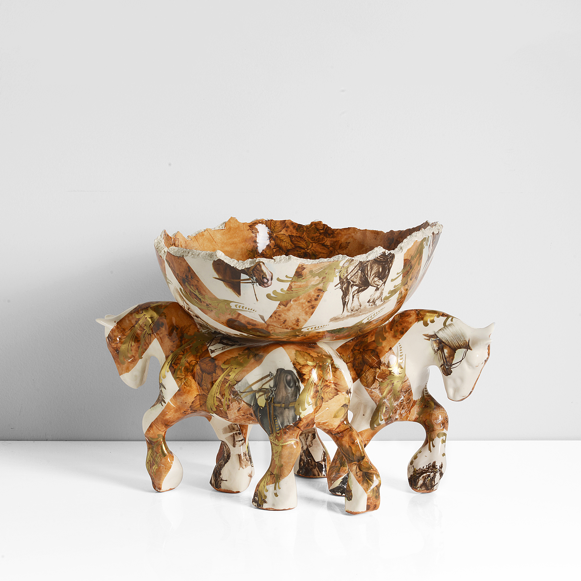 An earthenware slipcast wild west horse bowl made by Carol McNicoll in 2000 sold at auction by Maak