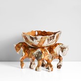 An earthenware slipcast wild west horse bowl made by Carol McNicoll in 2000 sold at auction by Maak