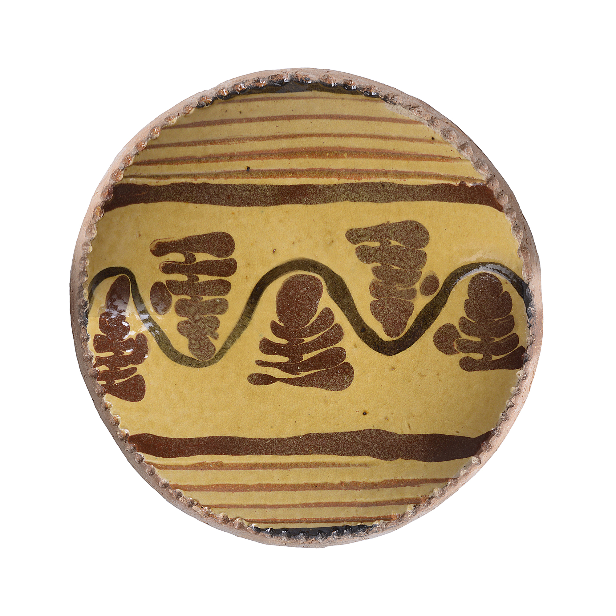 A slipware dish made by Bernard Leach sold at auction by Maak