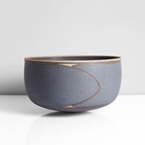 A grey blue stoneware bowl made by Alev Ebuzziya Siesbye in 1981 sold at auction by Maak