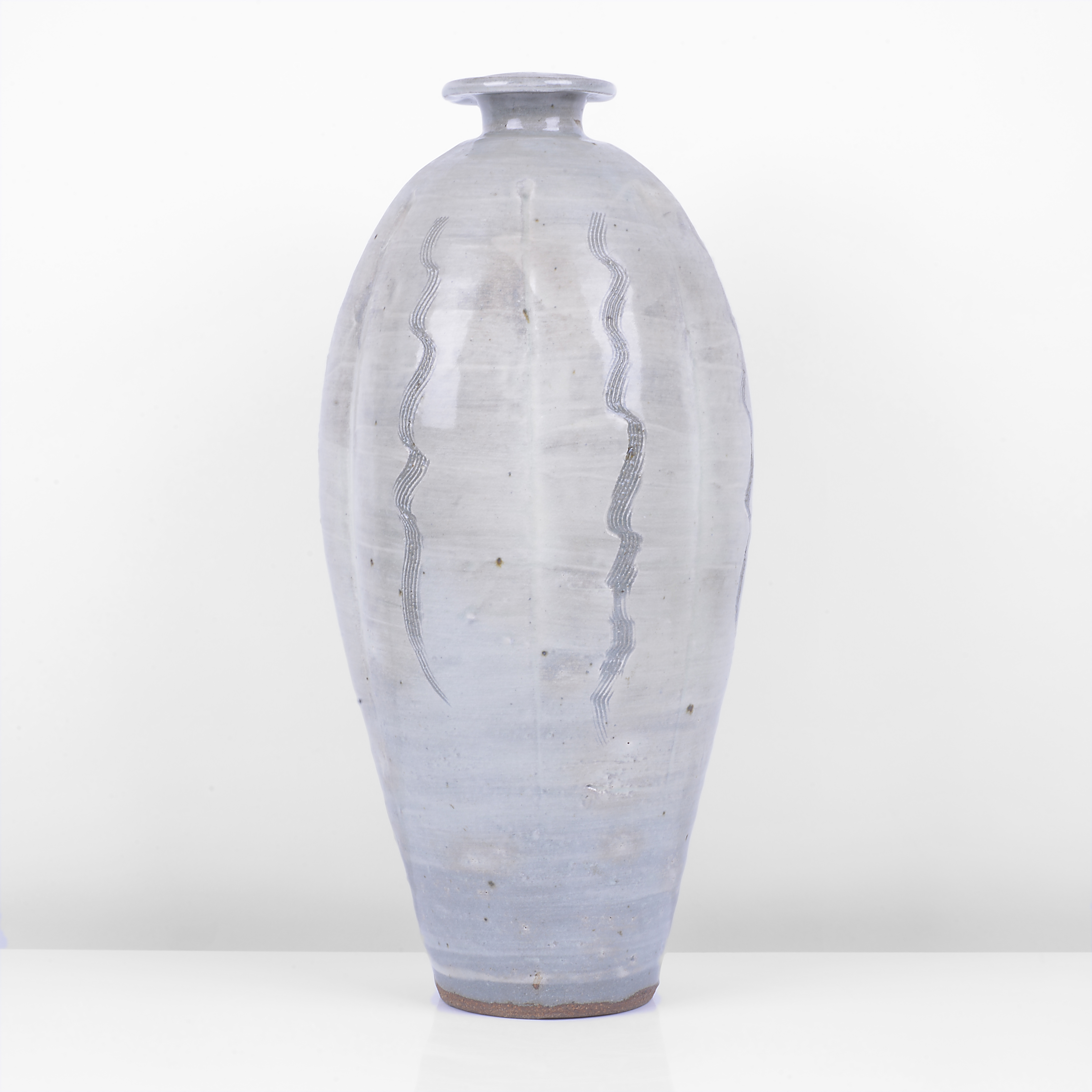 A stoneware bottle vase made by Bernard Leach in circa 1960 sold at auction by Maak