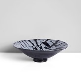 Earthenware, black and white marbled tin glaze to the well, black tin glaze to the exterior, incised signature