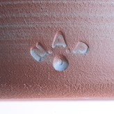 An impressed maker's mark on an earthenware bowl made by Nicholas Arroyave-Portela